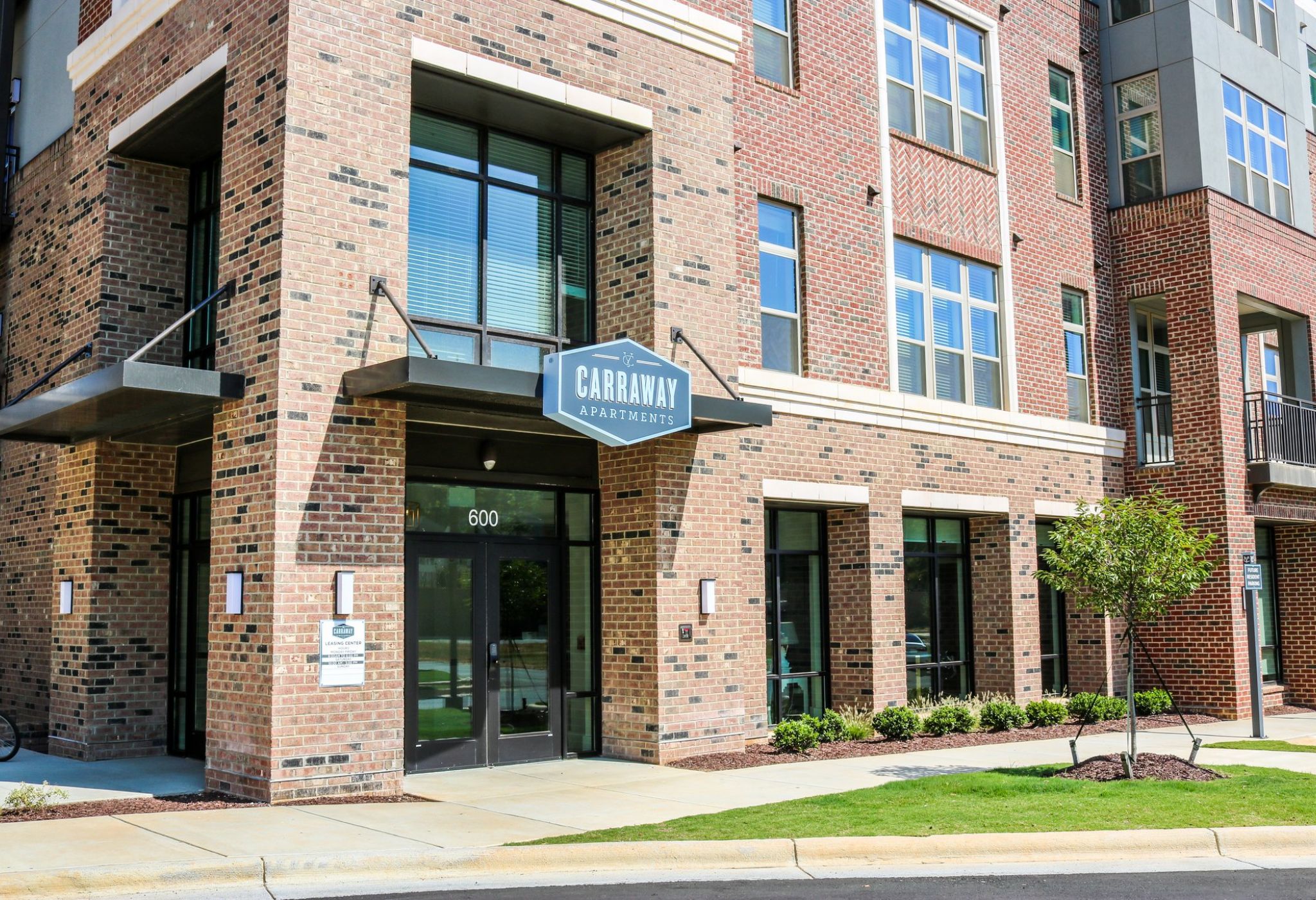 Exterior entrance to Carraway Village Apartments in Chapel Hill, NC