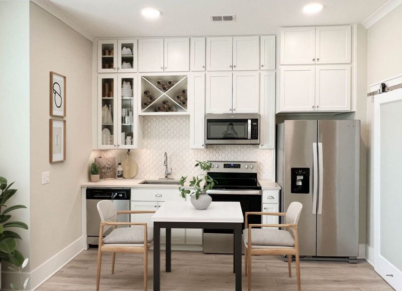 Studio apartment luxury kitchen with high-end finishes and appliances