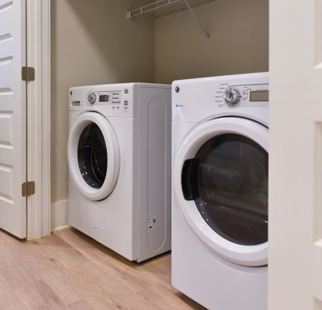 In-unit front load washer and dryer inside large closet